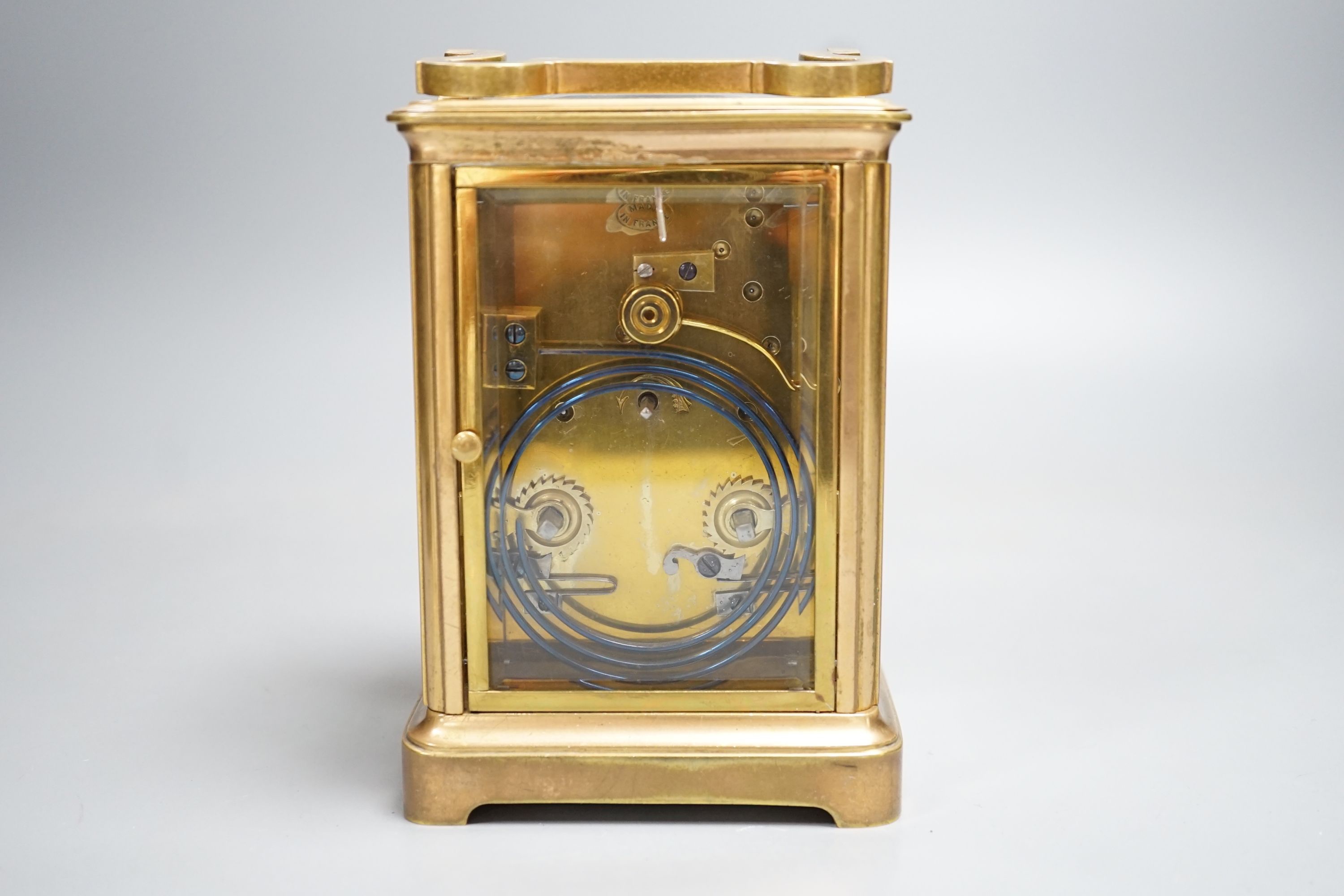 A French brass carriage clock, retailed by Drew and Sons, 166 Leadenhall Street London. 14.5cm (handle down)